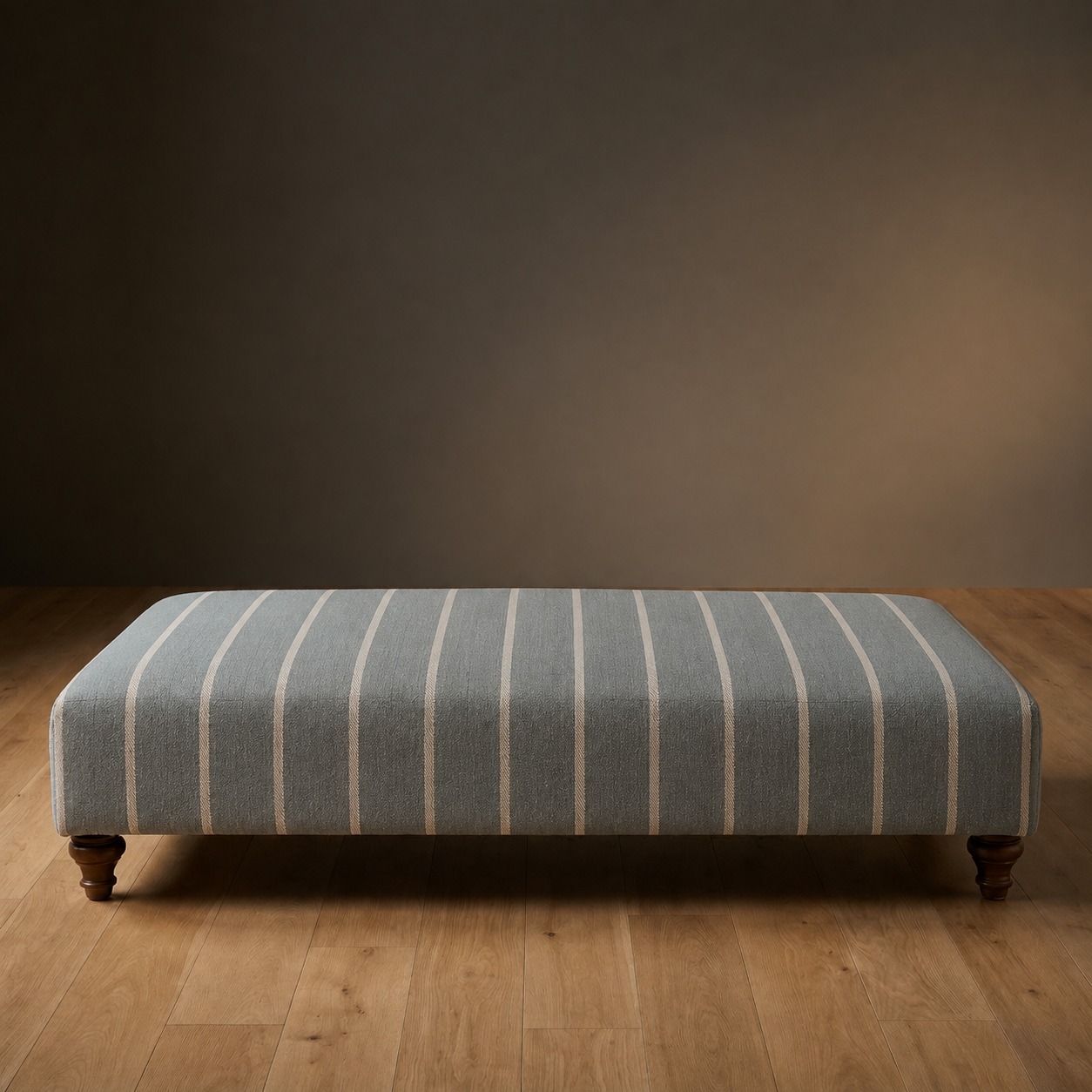 The Sterling Ottoman in Millfield Stripe