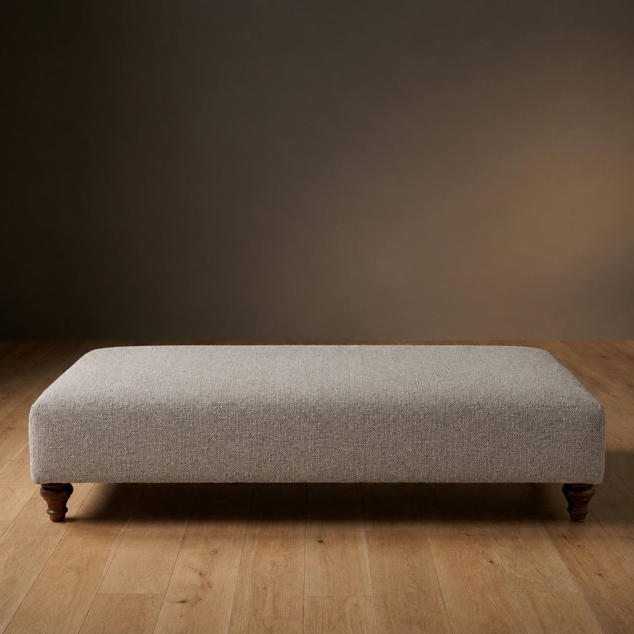 The Sterling Ottoman in Riverside Canvas