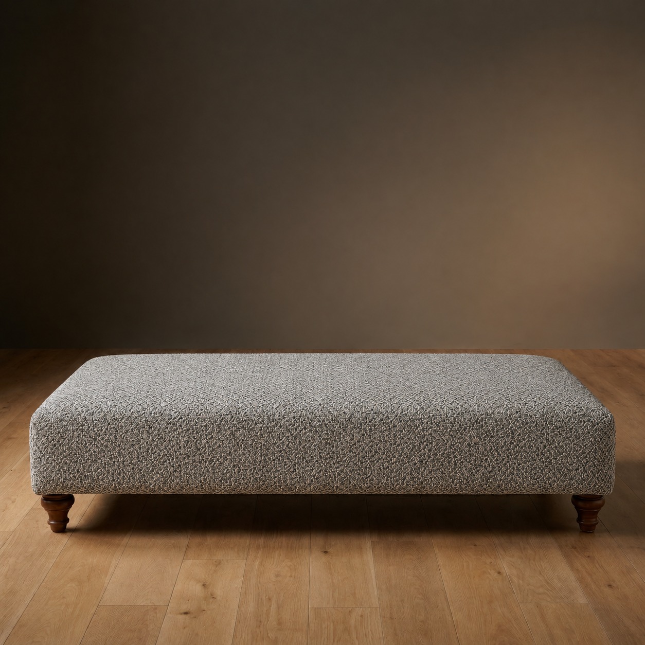 The Sterling Ottoman in Salt & Pepper